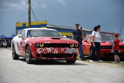 Red and white custom paint facelift Dodge Challenger front with halo headlights