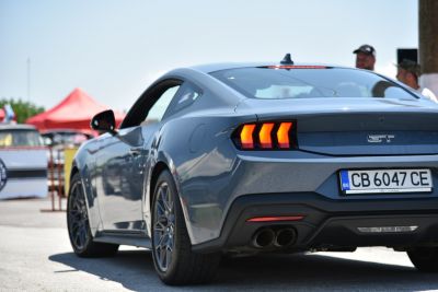 Rear view with triple-bar LED taillights and dual exhausts
