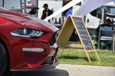 Close-up of Mustang VI facelift front headlight and grille