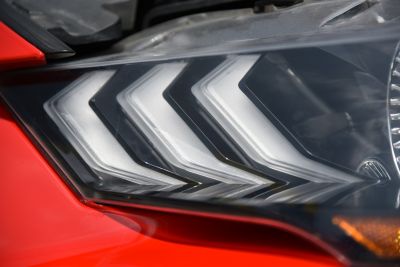 Sharp LED headlight with distinct sequential turn signals