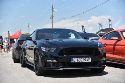 Aggressive front view of a black sports coupe with aerodynamic features