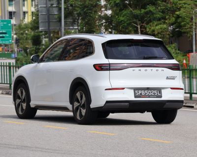 Rear view of sleek modern SUV with LED taillight strip