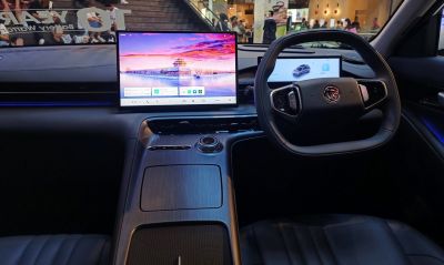 Dual digital displays and modern dashboard with steering wheel controls