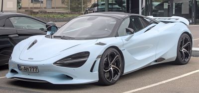 Front-side view with aerodynamic lines and distinct headlights
