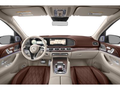 Luxurious SUV interior with dual widescreen displays and premium leather seats