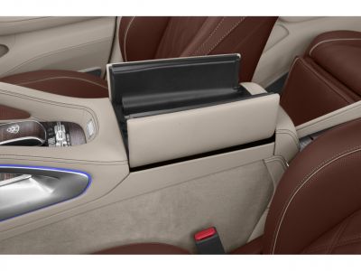 Luxury SUV interior center console storage and brown leather seats