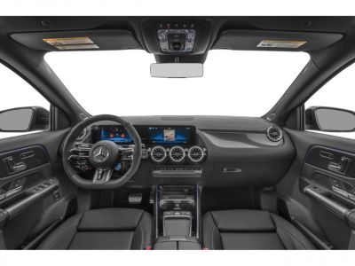 Interior with digital dashboard, sporty steering wheel, and carbon fiber trim
