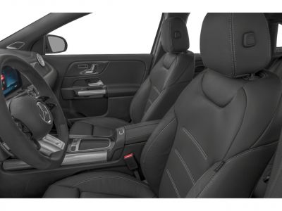 Black leather seats with stitching and a modern dashboard interior