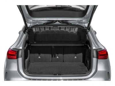 Spacious rear cargo area with secure cover and clean trunk space