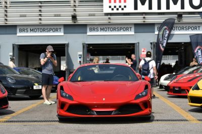 Front view of a red high-performance sports car with aerodynamic design