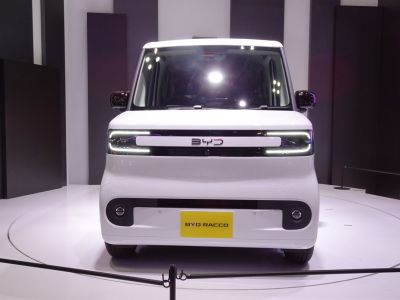 Front view of compact vehicle with LED headlights and symmetrical design.