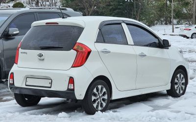 Compact hatchback rear with distinctive taillights and hatchback styling.
