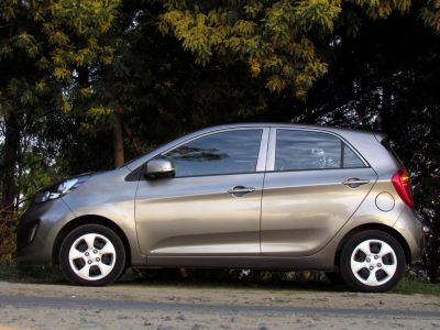 Side profile of a compact five-door hatchback with sleek body lines
