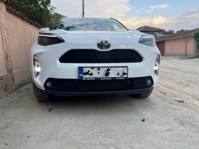 Front view including LED headlights and wide grille