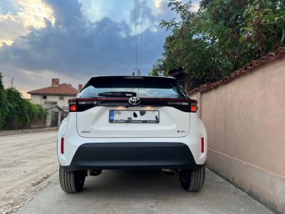 Sleek rear with horizontal tail light bar and smooth bumper