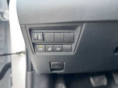 Control panel with light adjustment, heated steering wheel, and defroster buttons