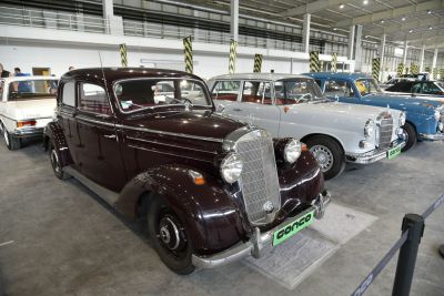 Vintage sedan with prominent front grille and round headlamps