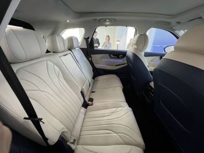 Spacious rear leather seats in modern car interior