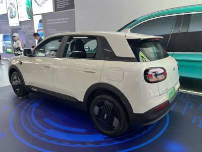 Rear side view of electric SUV with modern wheels and taillights