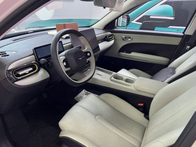 Modern car interior with digital dashboard and leather seating