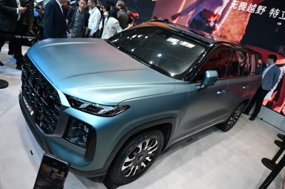 Bold black front grille and sleek angular headlights
