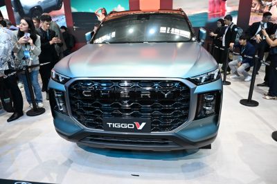 Bold front grille and sleek headlights of modern SUV