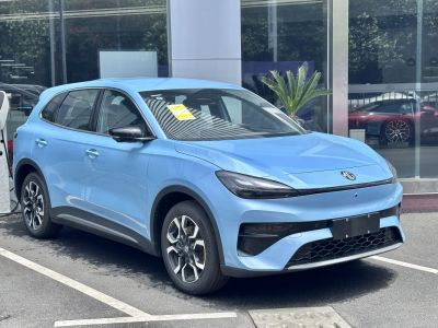 Front side view of modern electric SUV with sleek headlights
