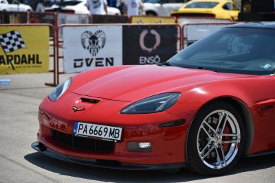 Front view with headlights and alloy wheel close-up