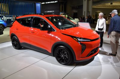 Electric SUV with sharp front LED headlights and black alloy wheels