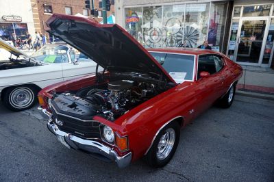 Classic Chevelle II Sport Coupe with open hood showing engine