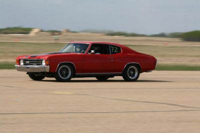 SS front grille and two-door sport coupe profile with racing stripes