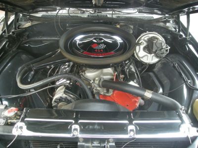 Detailed 454 Turbo-Jet V8 engine bay with polished components and classic muscle car features