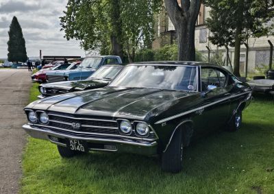 Front end with dual headlights and SS badge on vintage muscle car