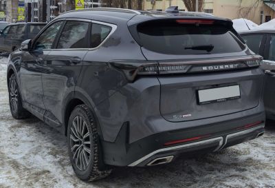 Rear profile with LED tail lights and sporty dual exhaust