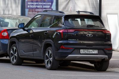 Rear view of a modern SUV with LED taillights and alloy wheels