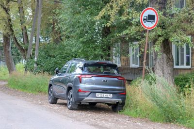 Rear view of compact SUV with LED tail lights and modern design.
