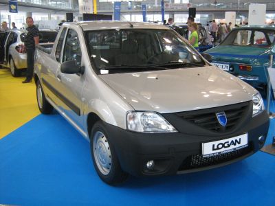 Compact pickup with cargo bed and black grille from front angle