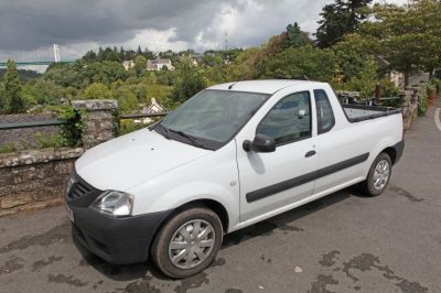Compact white small pickup with single cab and black exterior trim
