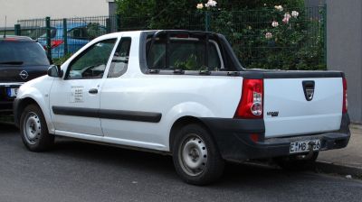 Pickup truck with extended cab and open cargo bed, white.