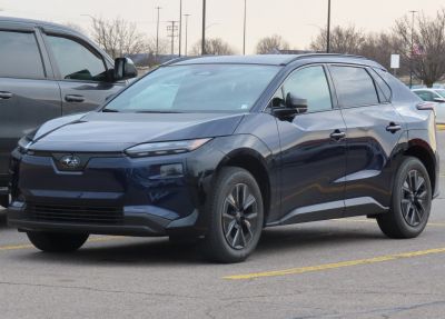 Modern electric SUV front-side view with LED headlights