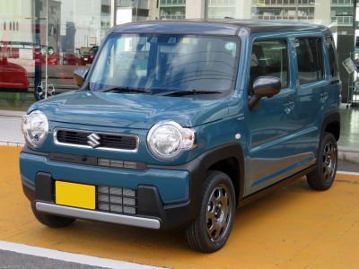 Compact kei SUV with round headlights and boxy design