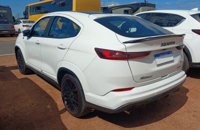 2024 Abarth Fastback 3/4 rear-left view