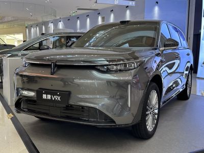 Sleek front design with distinctive LED headlights and aerodynamic styling
