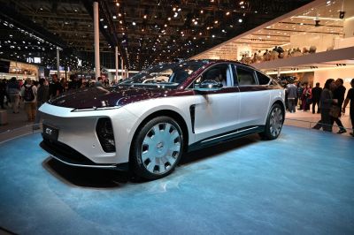 Sleek aerodynamic electric sedan with futuristic wheels