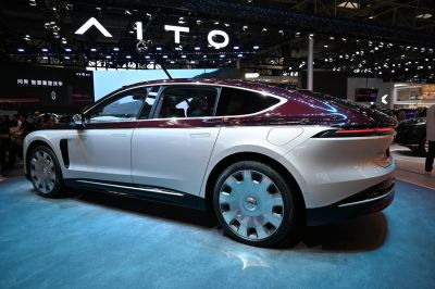 Two-tone electric luxury sedan with aerodynamic unique wheels