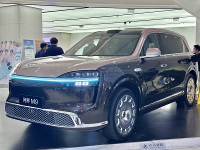 SUV with continuous LED headlight bar and digital display