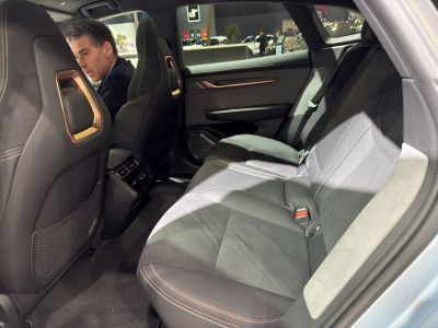 Rear passenger seat with leather upholstery and rear climate control panel