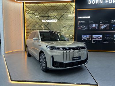 Vertical slat grille with integrated LED headlights on luxury SUV front.