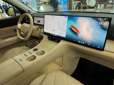 Ultra-wide digital dashboard and beige leather interior