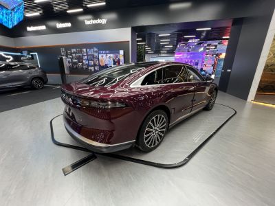 Modern rear end design with aerodynamic lines and distinctive taillights